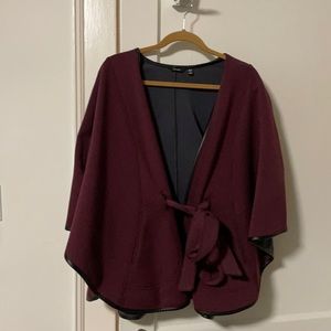 Cute poncho/cape in burgundy with Black trim - with pockets!